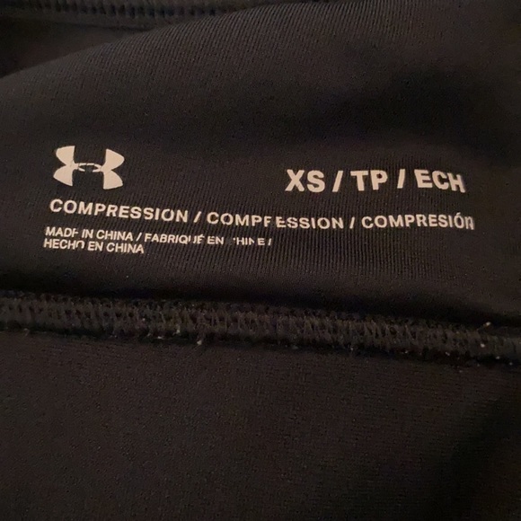 Under armour black sports bra with an adorable pocket in front. - Picture 7 of 8